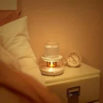 Xiaomi Sothing Smart Drink Warmer Coaster with Candlelight Effect keeping a coffee mug warm on a desk 1