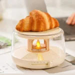 Xiaomi Sothing Smart Drink Warmer Coaster with Candlelight Effect keeping a coffee mug warm on a desk